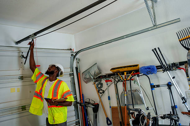 Professional Garage Door Panel Replacement technician working in Philipsburg, PA